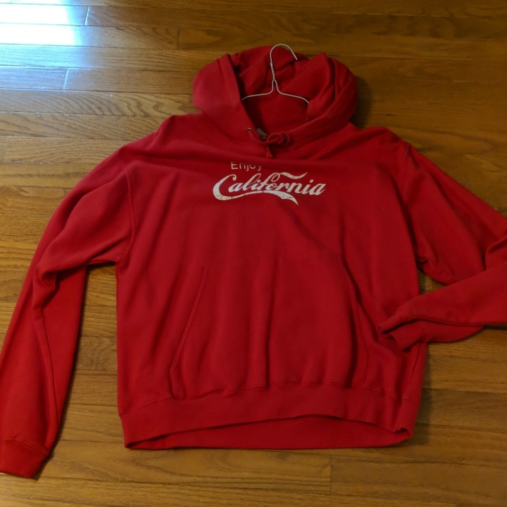 Red hooded sweatshirt.